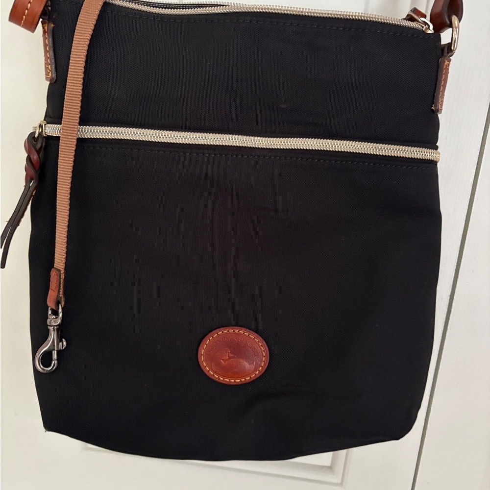 Vintage Dooney and Bourke Canvas messenger bag black.